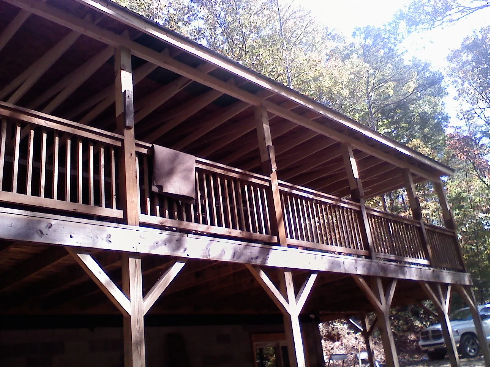 Timber framing under a new elevated porch and deck — Roof Leak Repair in Vergennes by Roofing Brothers